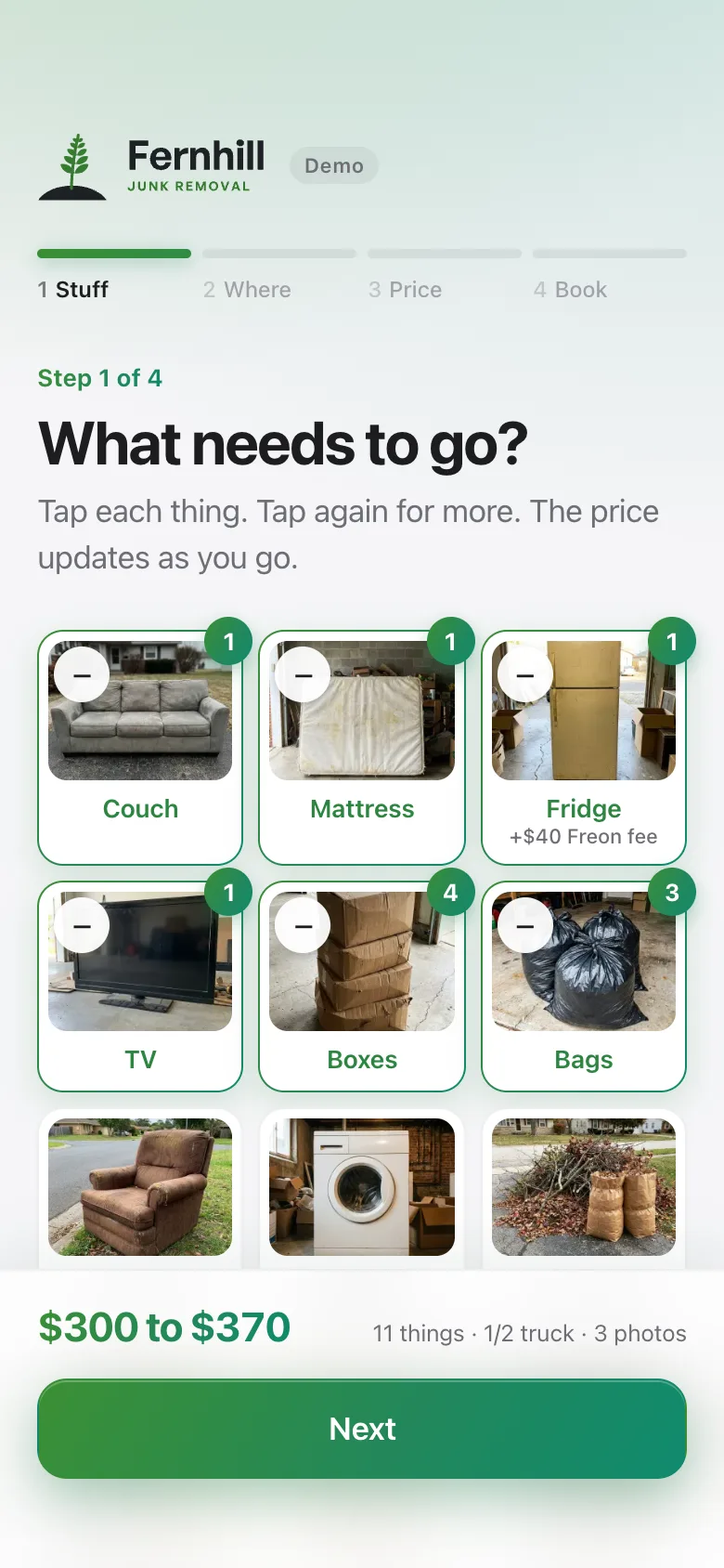 The first screen on a phone: a couch, mattress, fridge, TV, boxes and bags tapped, and the price at the bottom